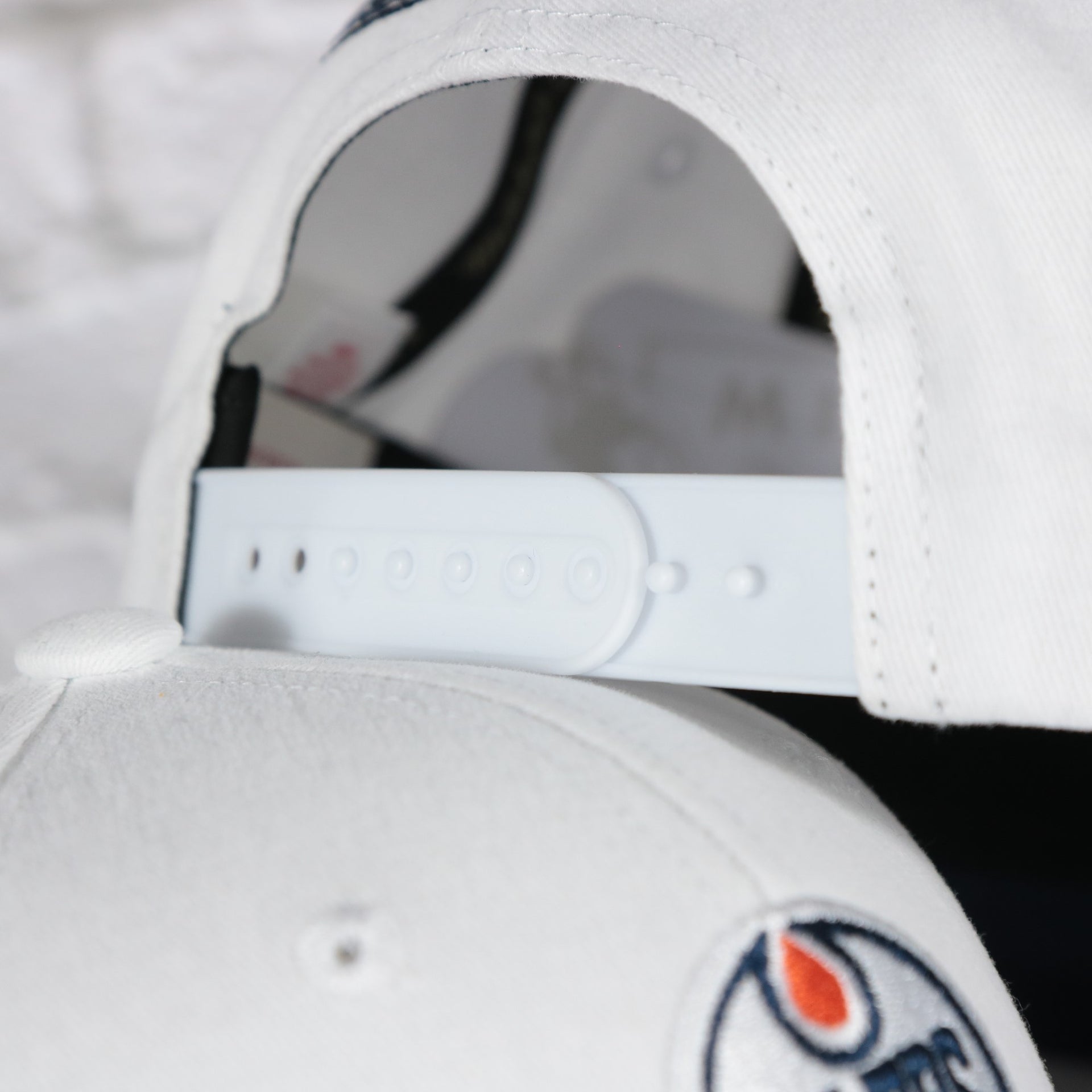 white adjustable snap on the Edmonton Oilers NHL All in Pro Navy Bottom | White Snapback Hat