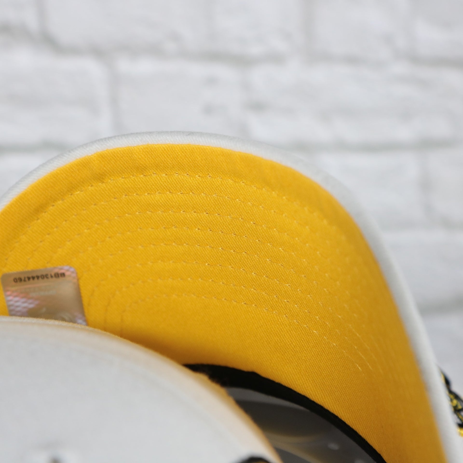 yellow under visor on the Boston Bruins NHL All in Pro Yellow Bottom | White Snapback Hat