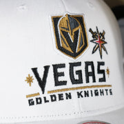 golden knights logo on the Vegas Golden Knights NHL All in Pro Tan Bottom | White Snapback Hat