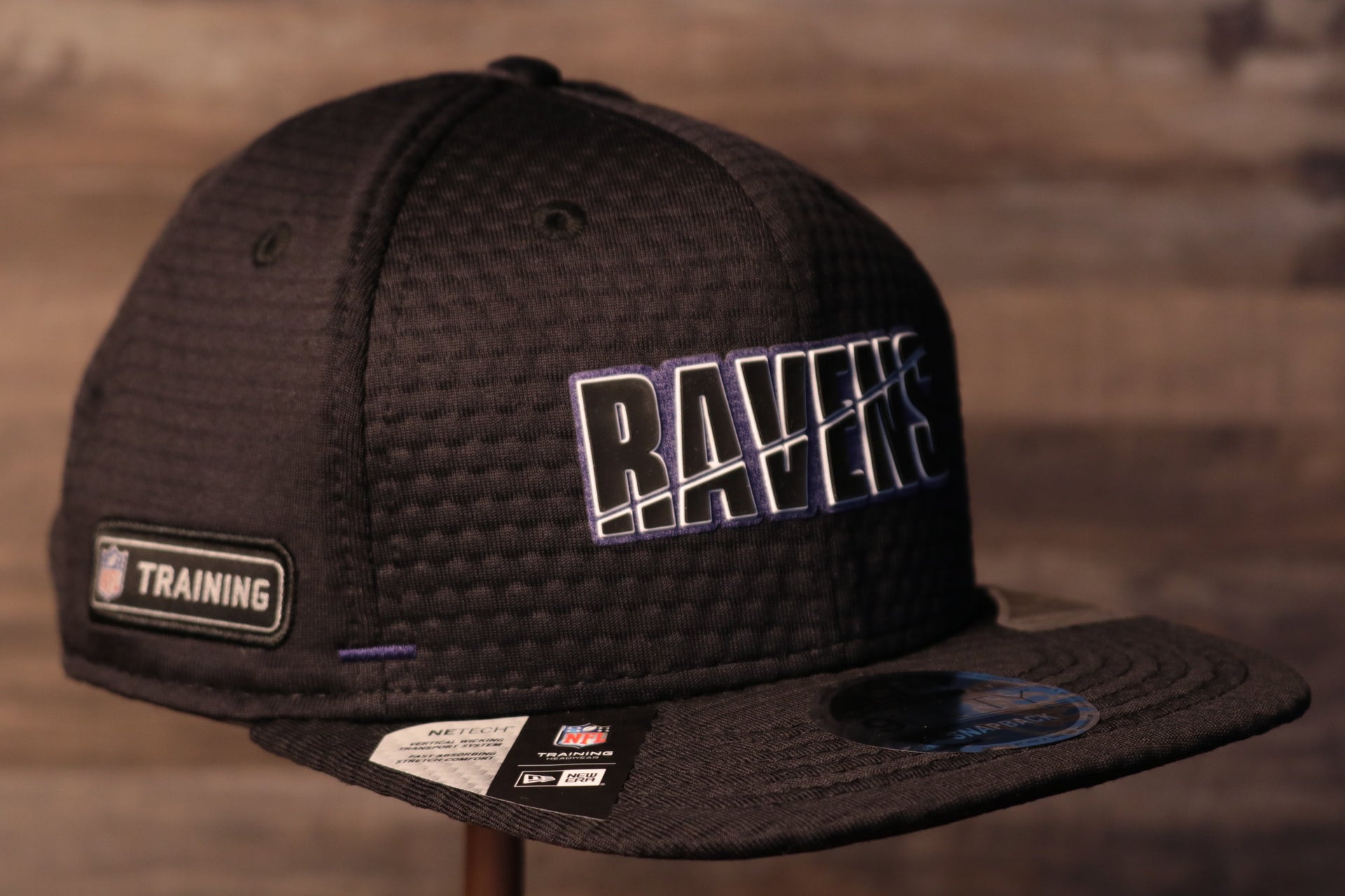 This hat is perfect for working out with because of its breathable material Ravens 2020 Training Camp Snapback Hat | Baltimore 2020 On-Field Black Training Camp Snap Cap