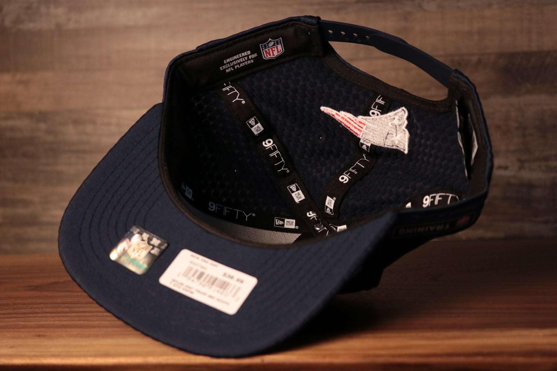 The underside is very stretchy and breathable Patriots 2020 Training Camp Snapback Hat | New England Patriots 2020 On-Field Navy Training Camp Snap Cap