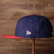 The wearer's left on the Philadelphia Phillies Blue on Red Game Authentic 59Fifty Fitted Cap