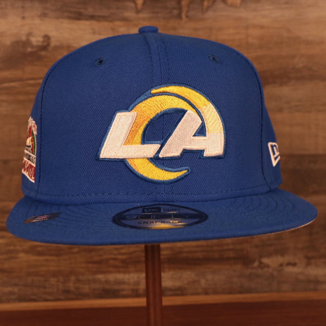 front of the Los Angeles Rams "Patch Up" 1990 Pro Bowl Side Patch Gray Bottom 59Fifty Royal Fitted Cap