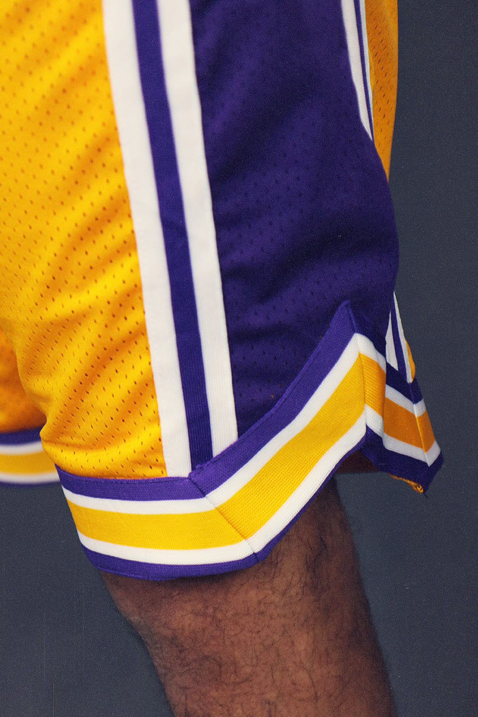 Bottom Side view of the Men's Hooper Basketball Workout Gold Los Angeles Mesh Retro Shorts