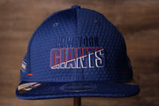 Giants 2020 Training Camp Snapback Hat | New York Giants 2020 On-Field Red Training Camp Snap Cap the front of this cap has the giant logo and the city name