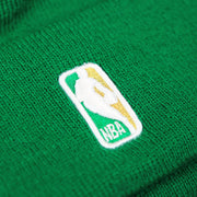 The NBA Jerrywest Logo on the Boston Celtics NBA City Series Metallic Gold Clover Winter Beanie | Green Winter Beanie