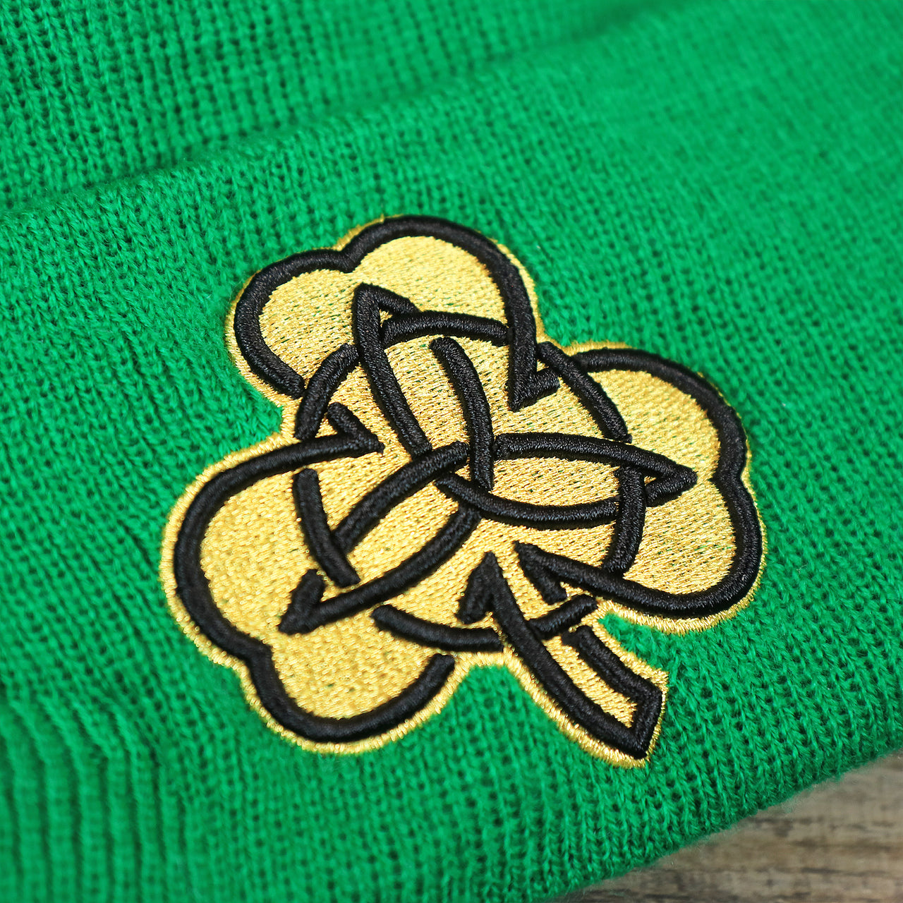 The Clover on the Boston Celtics NBA City Series Metallic Gold Clover Winter Beanie | Green Winter Beanie
