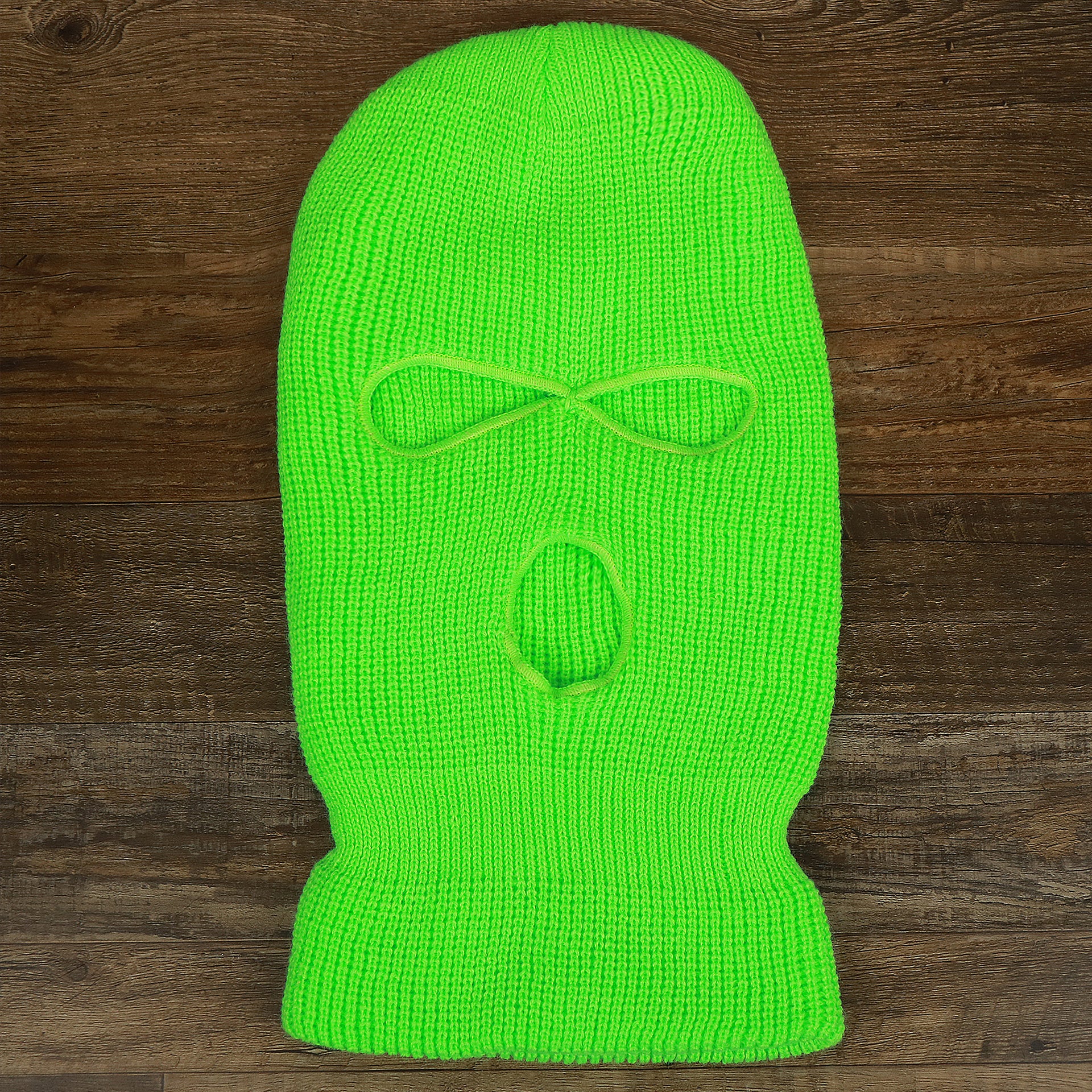 The Safety Green Snug Fit Three Hole Balaclava | Neon Green Knit Ski Mask on the ground