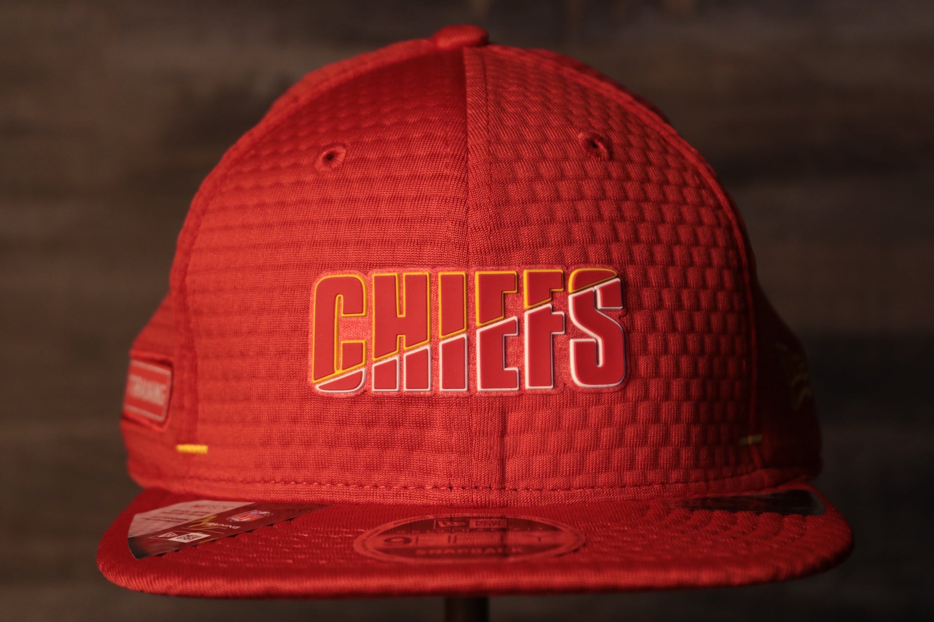 Chiefs 2020 Training Camp Snapback Hat | Kansas City Chiefs 2020 On-Field Red Training Camp Snap Cap the front of this chiefs hats has the chiefs name on it