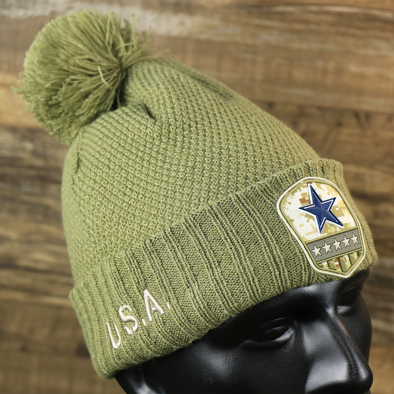 The Women’s Dallas Cowboys Salute To Service Ribbon Rubber Military Cowboys Patch On Field NFL Beanie | Women’s Military Green Beanie