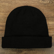 The front of the Black Fisherman Knit Cuffed Beanie