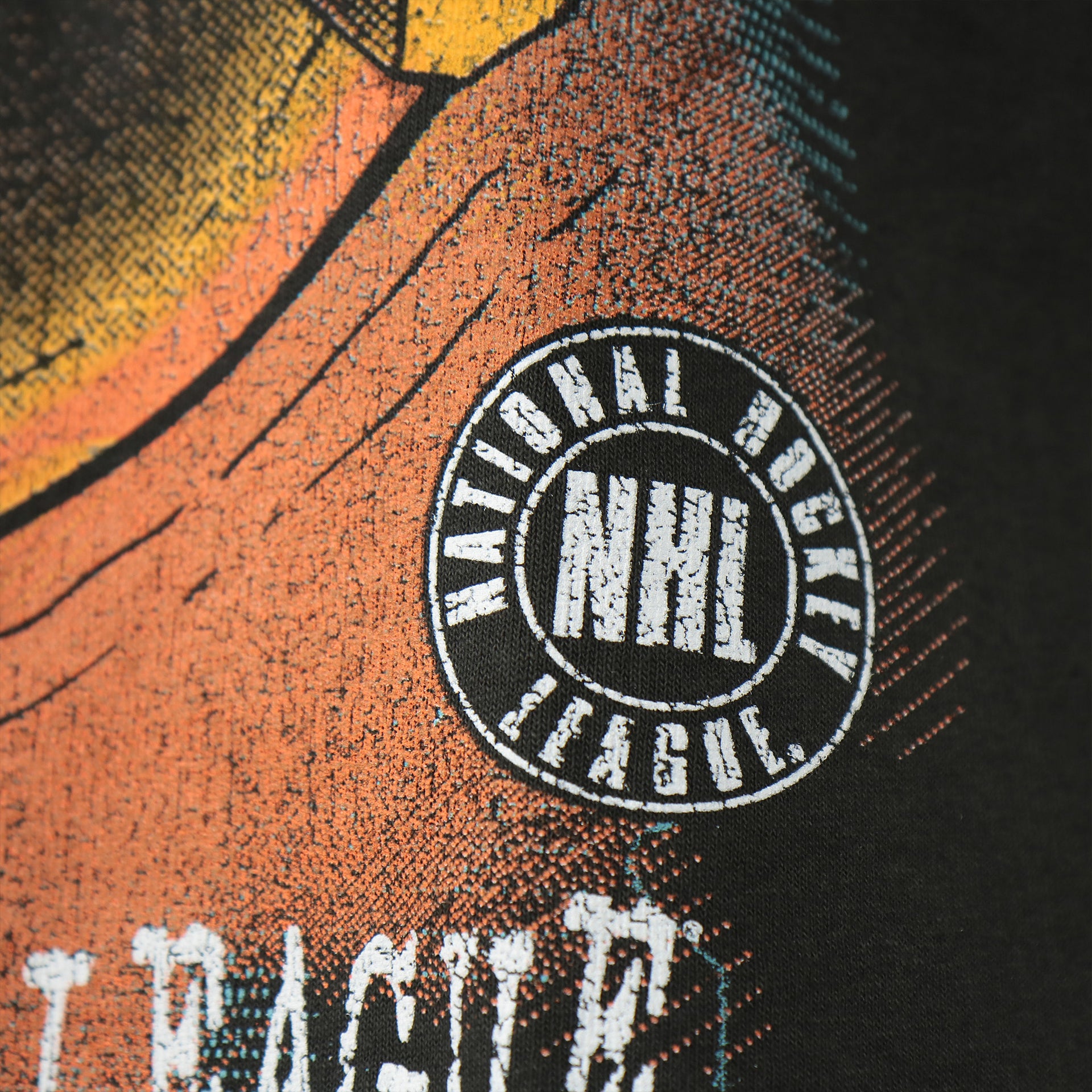 Circle NHL logo on the front of the Philadelphia Flyers Liberty Bell Vintage Tubular Distressed T-Shirt | Flint Black