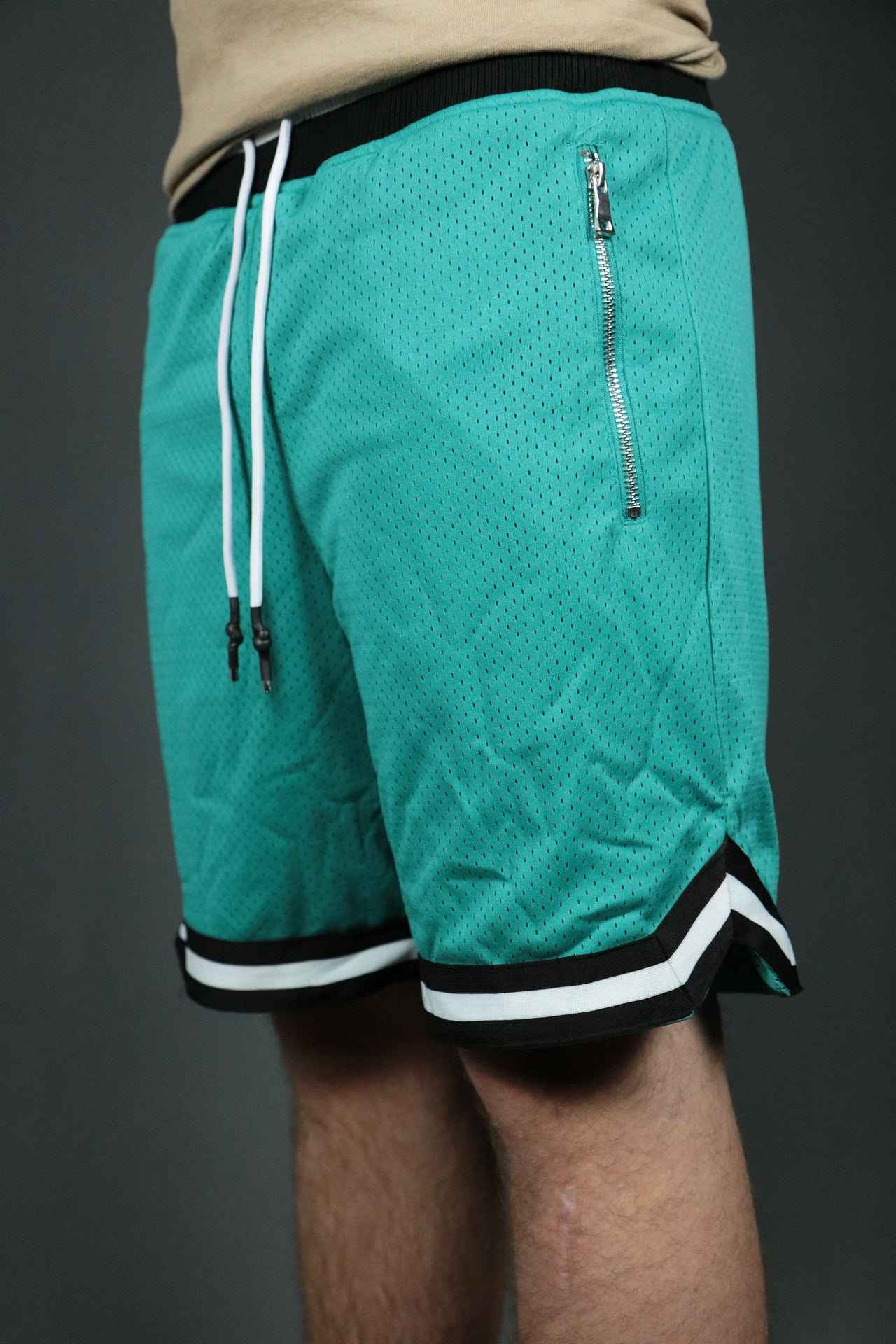 The aqua retro San Antonio mens shorts with zipper pockets by Jordan Craig.