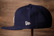 The wearers left side has the new era logo on it Dodgers Gray Bottom Fitted Cap | Los Angeles Dodgers Grey Bottom Royal Blue Fitted Hat