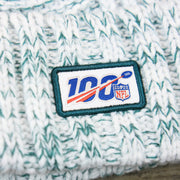 The NFL 100 Logo on the Women’s Philadelphia Eagles On Field Cuffed Winter Beanie | White And Teal Winter Beanie