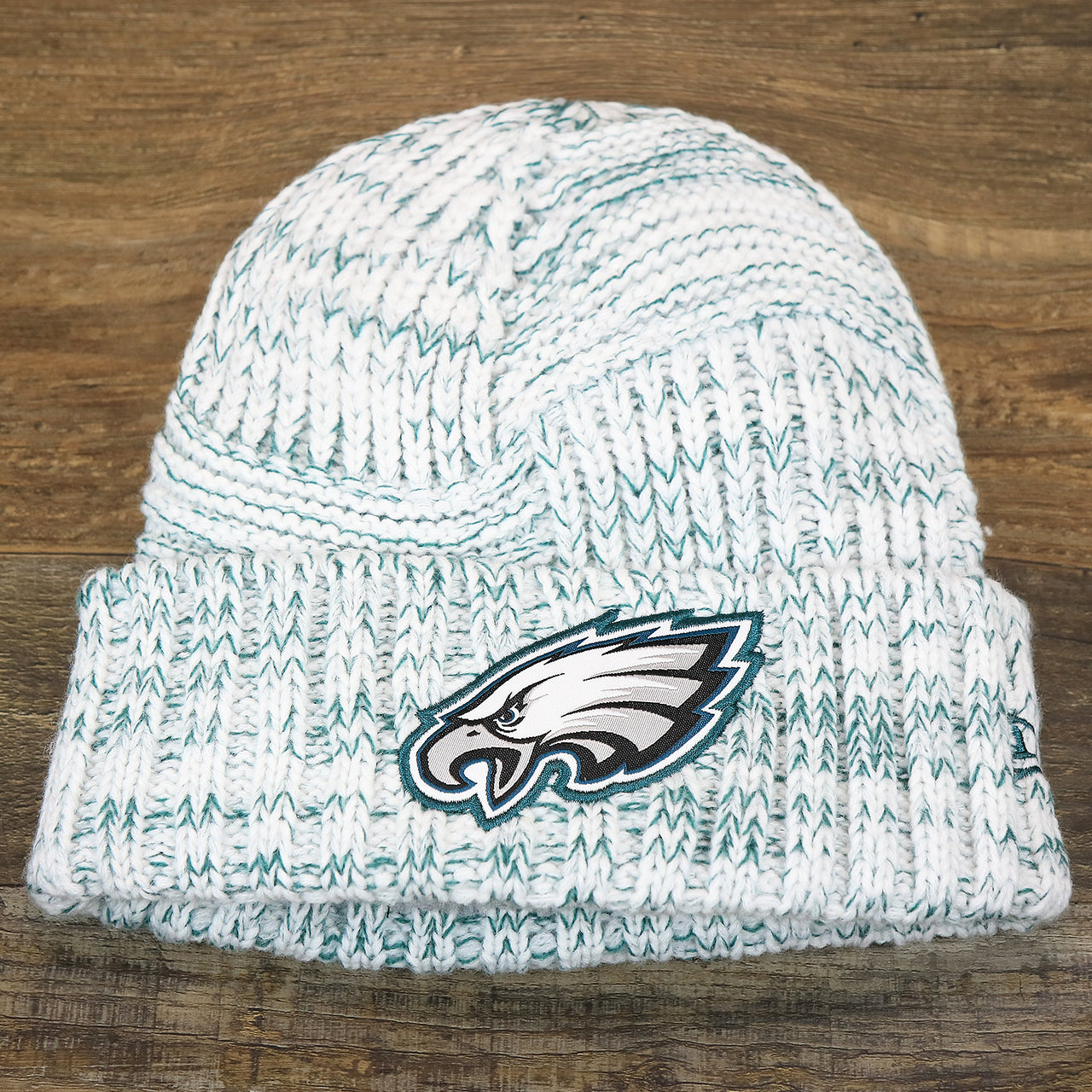 The front of the Women’s Philadelphia Eagles On Field Cuffed Winter Beanie | White And Teal Winter Beanie