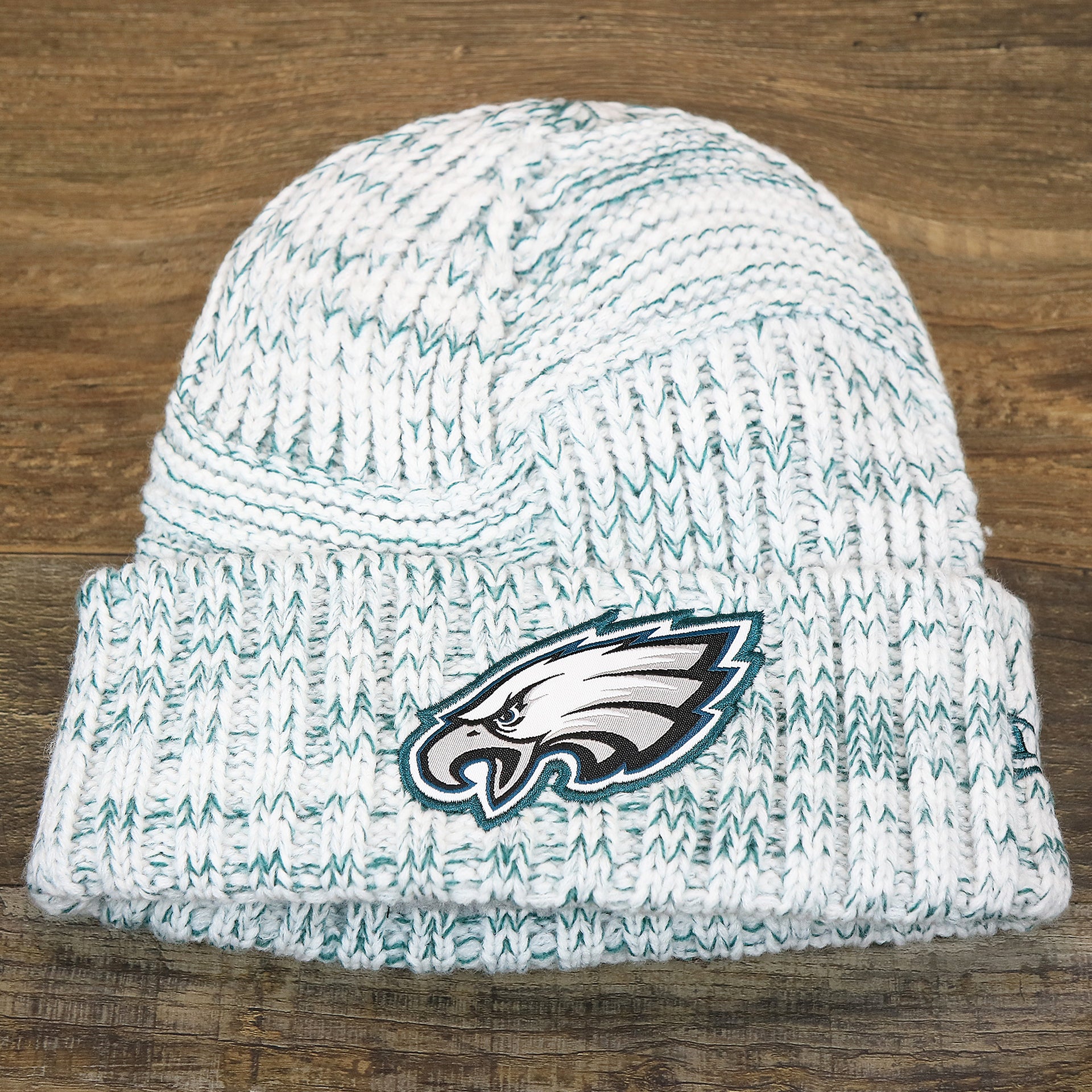 The front of the Women’s Philadelphia Eagles On Field Cuffed Winter Beanie | White And Teal Winter Beanie
