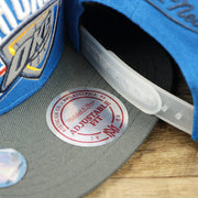 The Mitchell And Ness Sticker on the Thunder Snapback Hat | Oklahoma City Thunder Reflective 2-Tone Snap Cap