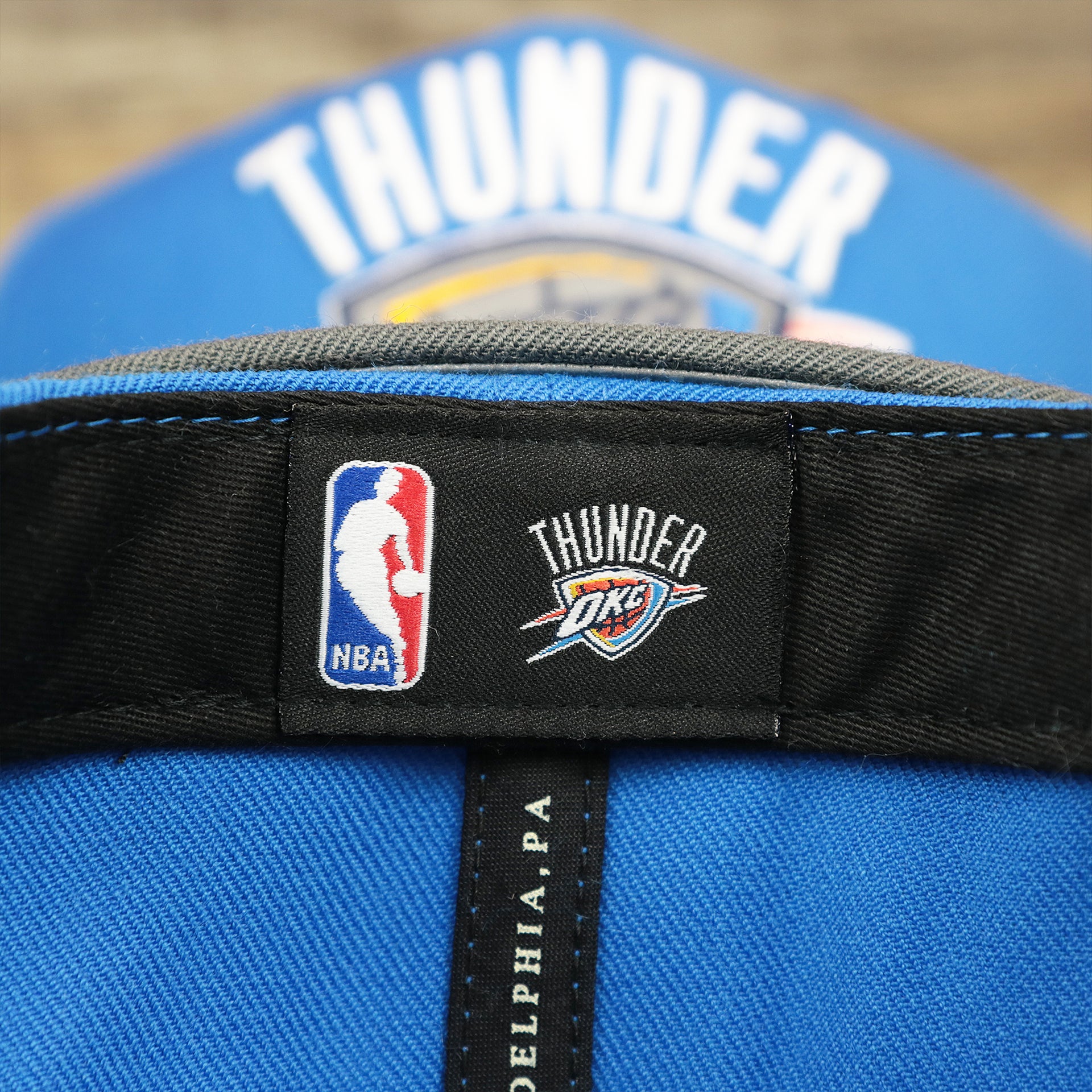 The NBA Tag on the Thunder Snapback Hat | Oklahoma City Thunder Reflective 2-Tone Snap Cap