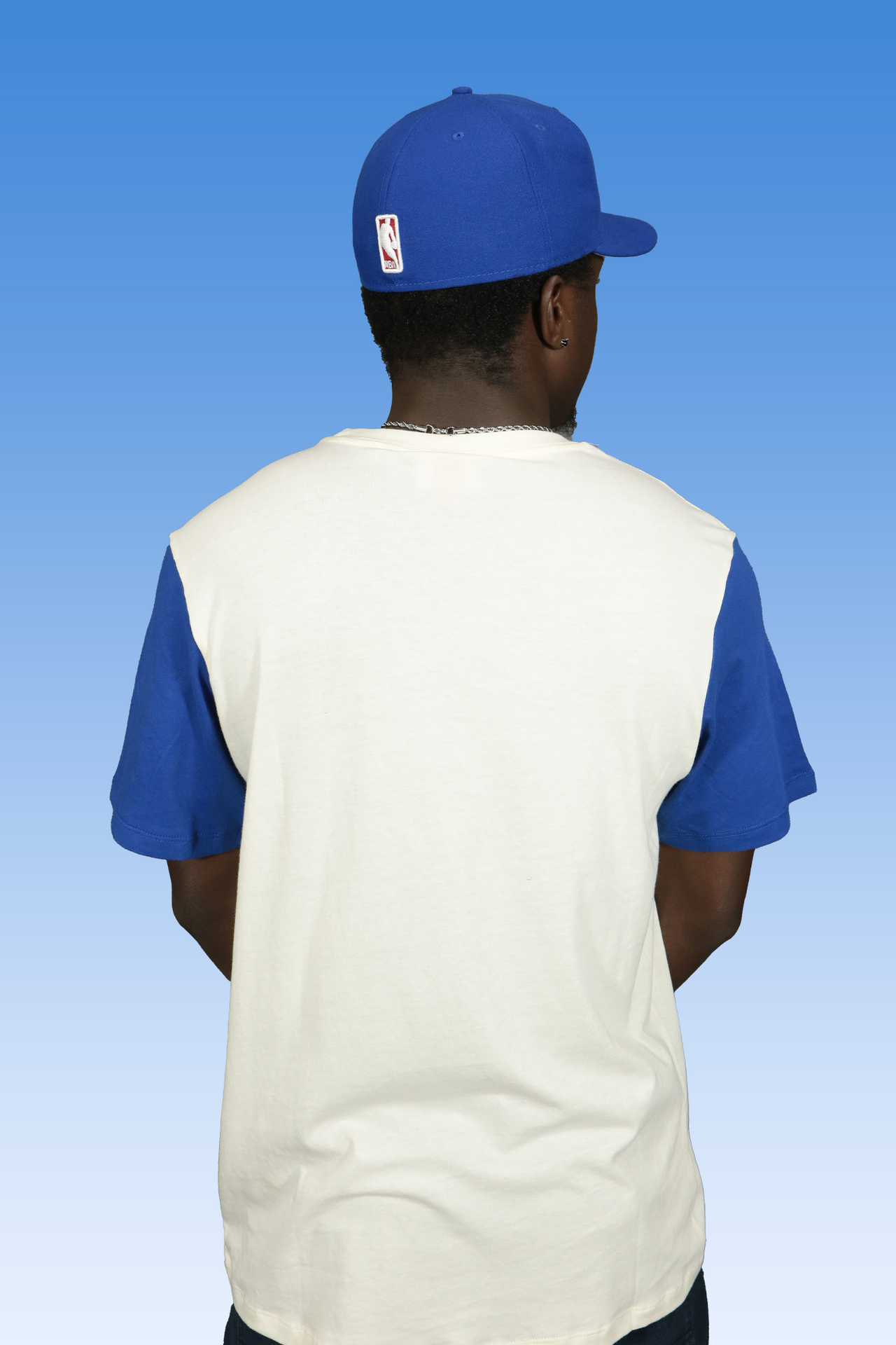 back of the Philadelphia 76ers Liberty Bell logo Hardwood Classics Color Blocked Tee | Royal/Cream T-Shirt
