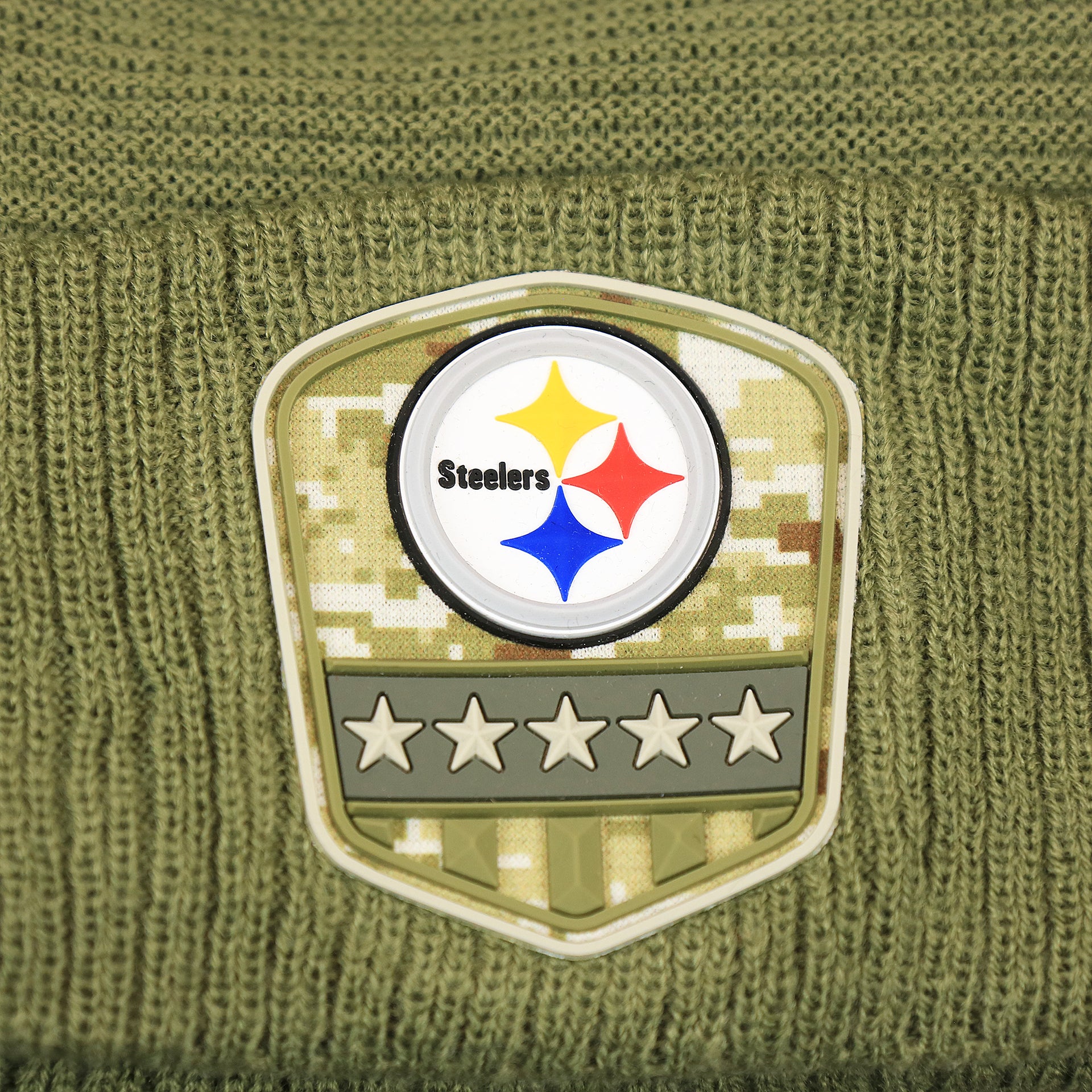 The Steelers Logo on the Pittsburgh Steelers Salute To Service Ribbon Rubber Military Steelers Patch On Field NFL Beanie | Military Green Beanie