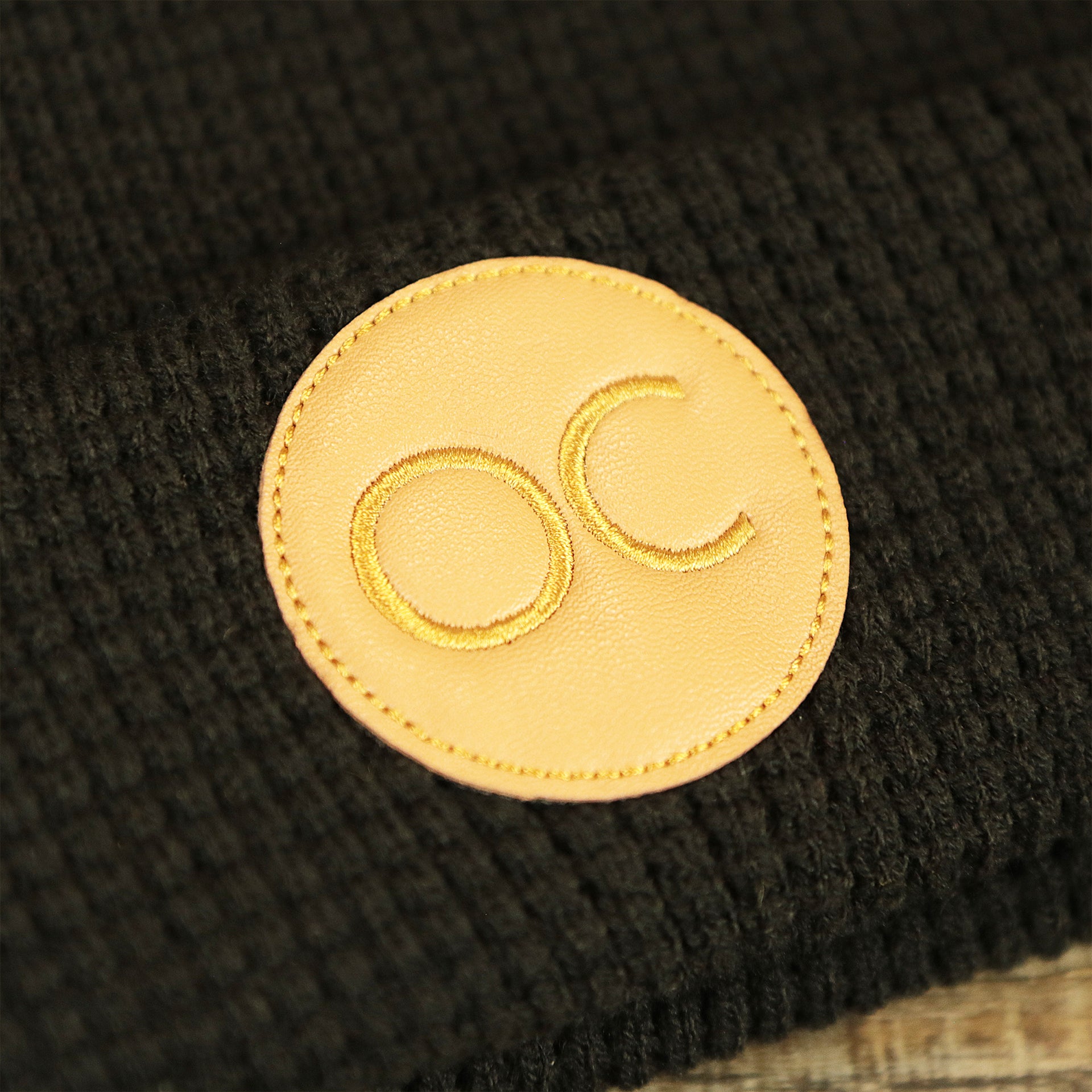The Ocean City Leather Patch on the Ocean City New Jersey Leather OC Logo Waffle Knit Cuffed Beanie