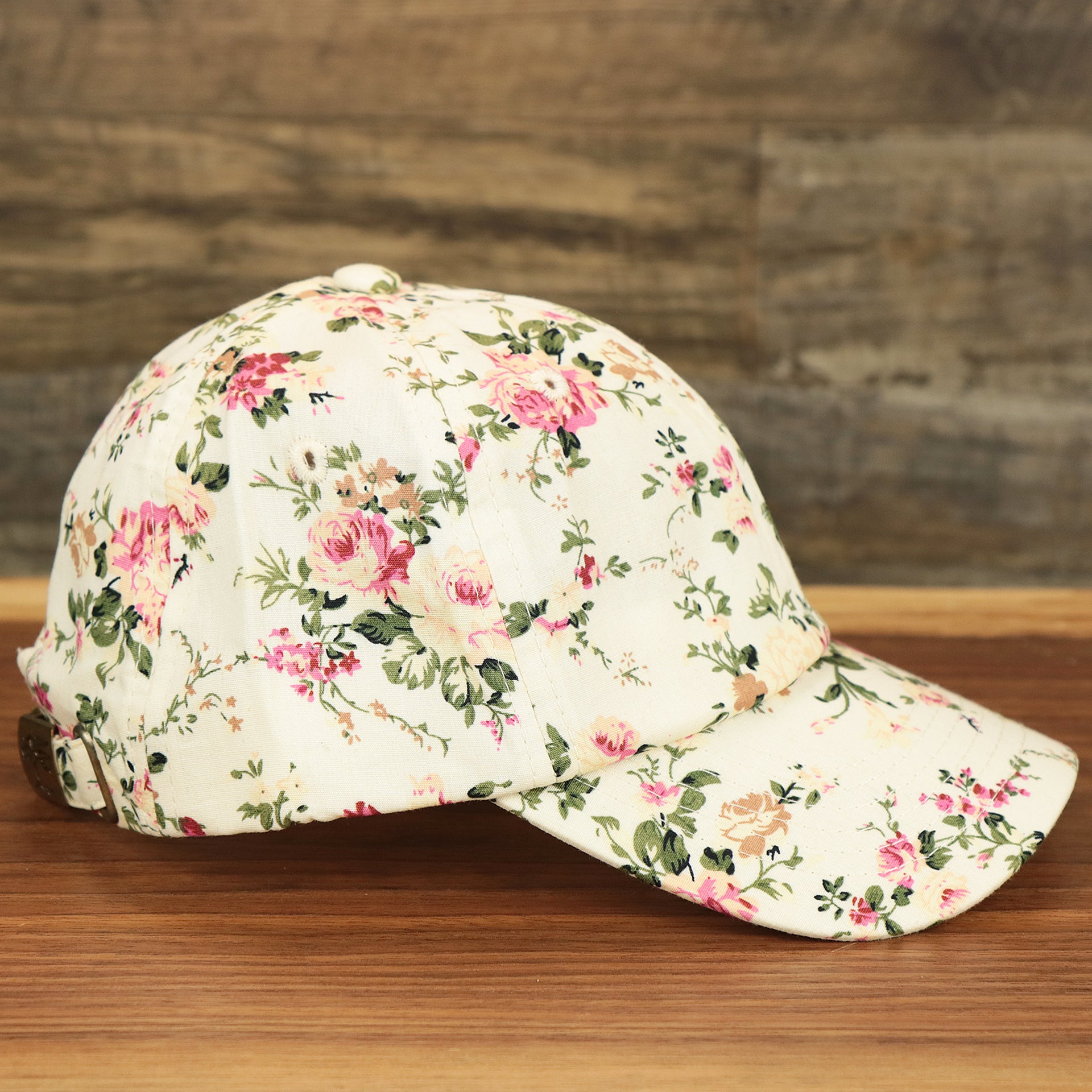 The wearer's right on the Kid’s Floral Print Blank Adjustable Baseball Hat | Youth Cream Dad Hat