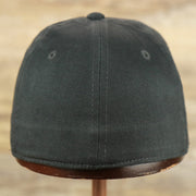 The backside of the Youth Jet Black Structured Cotton Blank Flexfit Cap | Kid’s Black Stretch Fit Caps