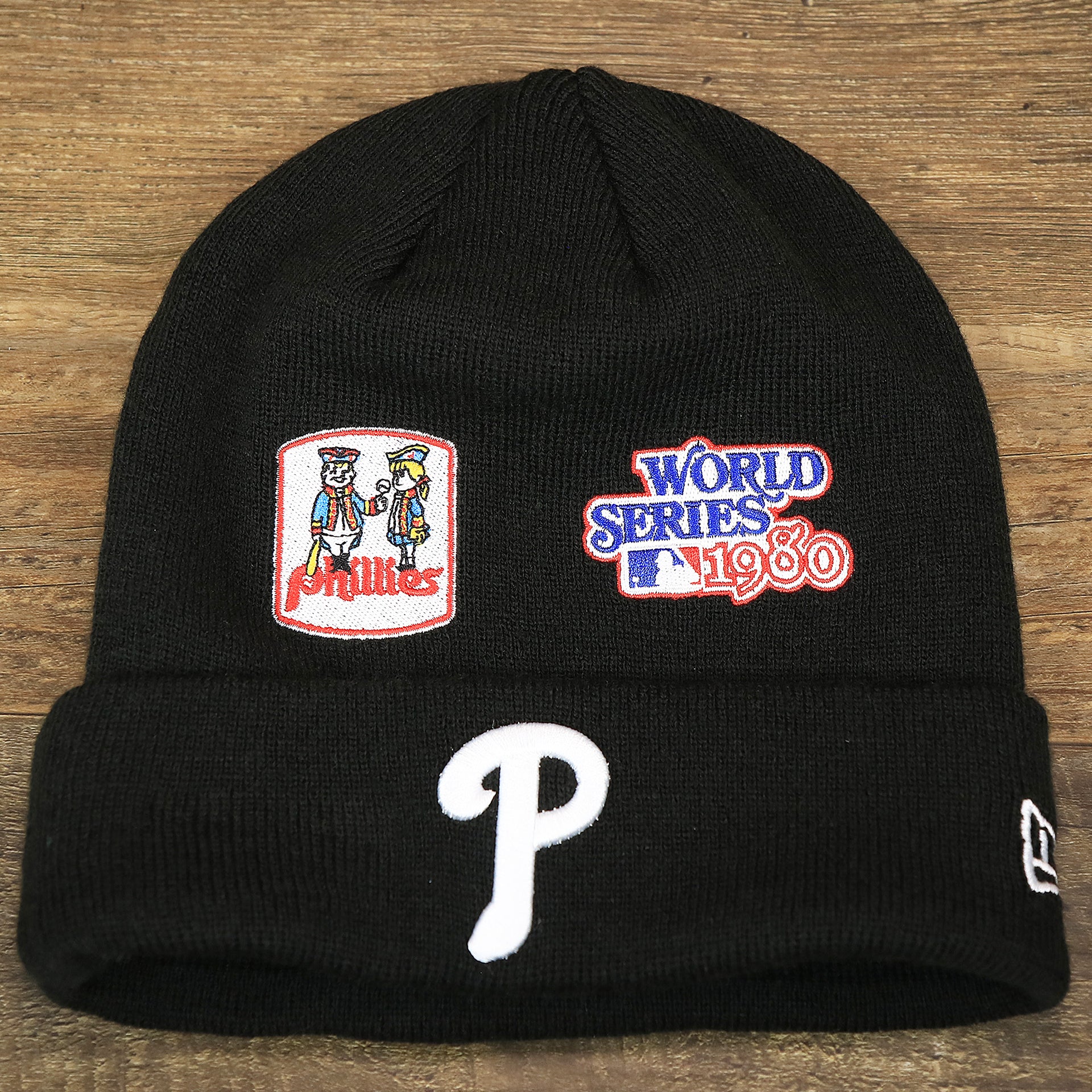 The front of the Philadelphia Phillies All Over World Series Side Patch 2x Champion Knit Cuff Beanie | New Era, Black