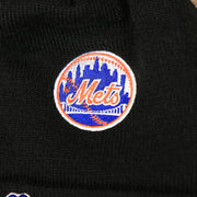 The Mets Baseball Logo on the New York Mets All Over World Series Side Patch 2x Champion Knit Cuff Beanie | New Era, Black