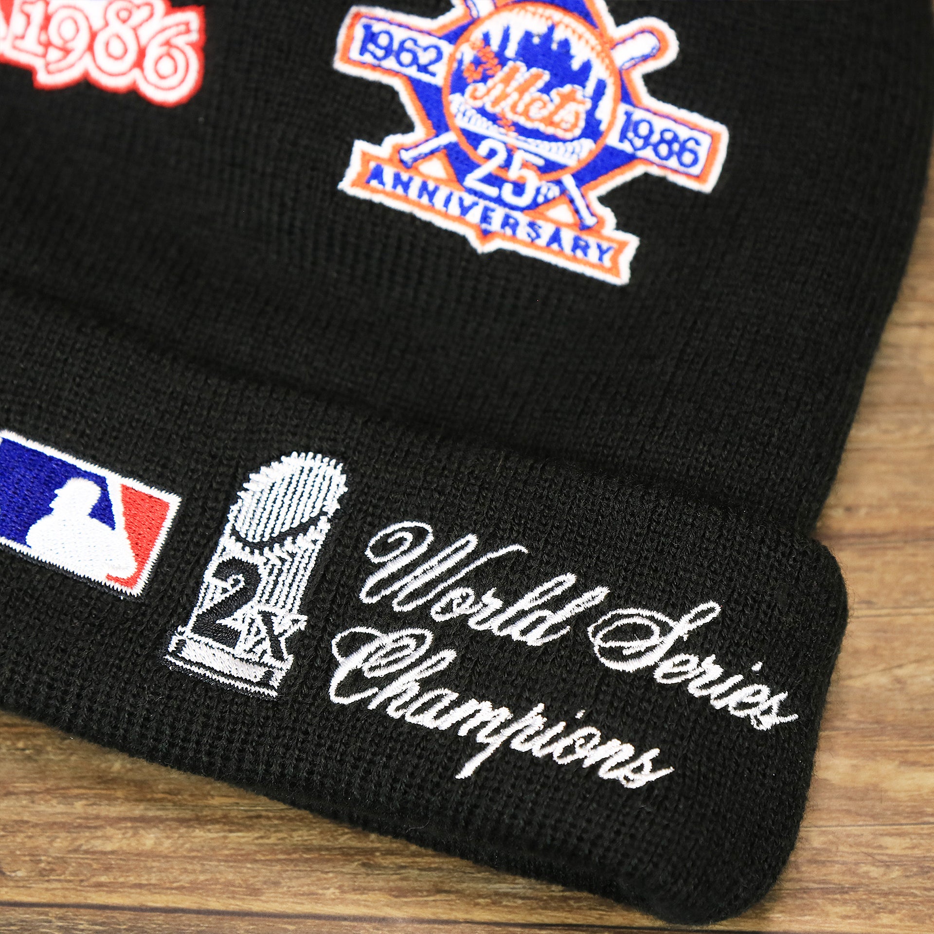 The World Series 2x Champions on the New York Mets All Over World Series Side Patch 2x Champion Knit Cuff Beanie | New Era, Black