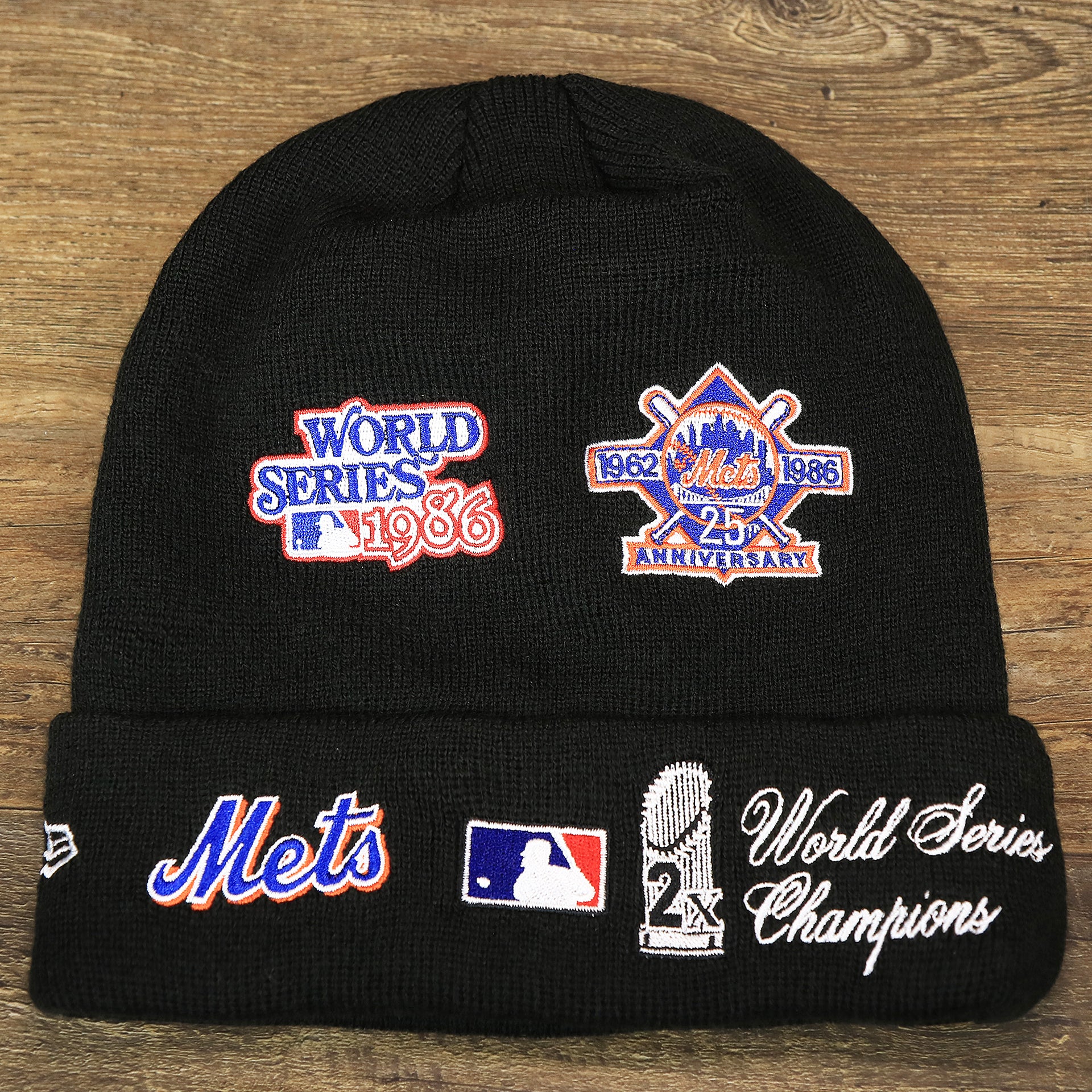 The backside of the New York Mets All Over World Series Side Patch 2x Champion Knit Cuff Beanie | New Era, Black