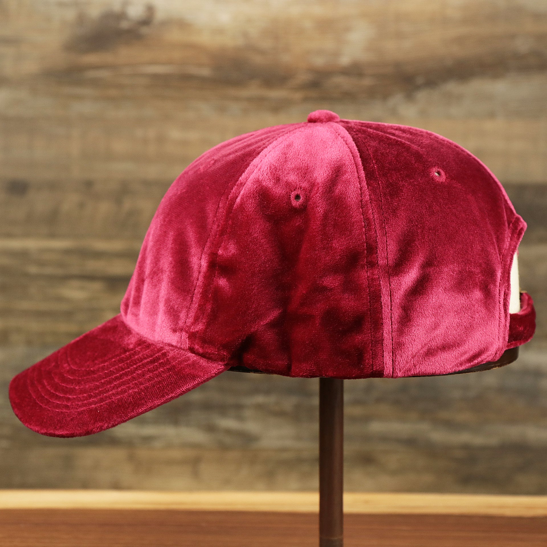 The wearer's left of the Velour Blank Ox Blood Baseball Hat | Dark Red Dad Hat