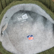 The Lining on the Youth Dallas Cowboys on Field Salute To Service Ribbon American Flag Side Patch Winter Beanie | Kid’s Olive Green Winter Beanie