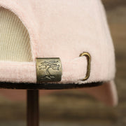 The metallic Buckle on the Blank Misty Rose Wash Cloth Baseball Hat | Light Pink Dad Hat