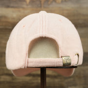 The backside of the Blank Misty Rose Wash Cloth Baseball Hat | Light Pink Dad Hat