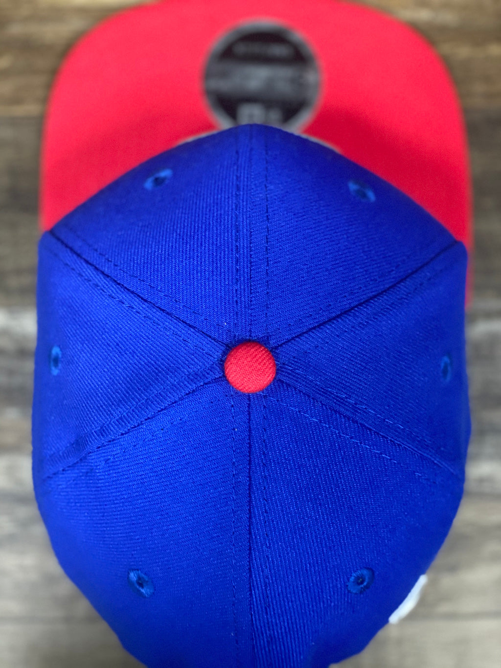 top button view of sixers snapback hat | 76ers colorway 950 snapback | Blue and red 76er snapback