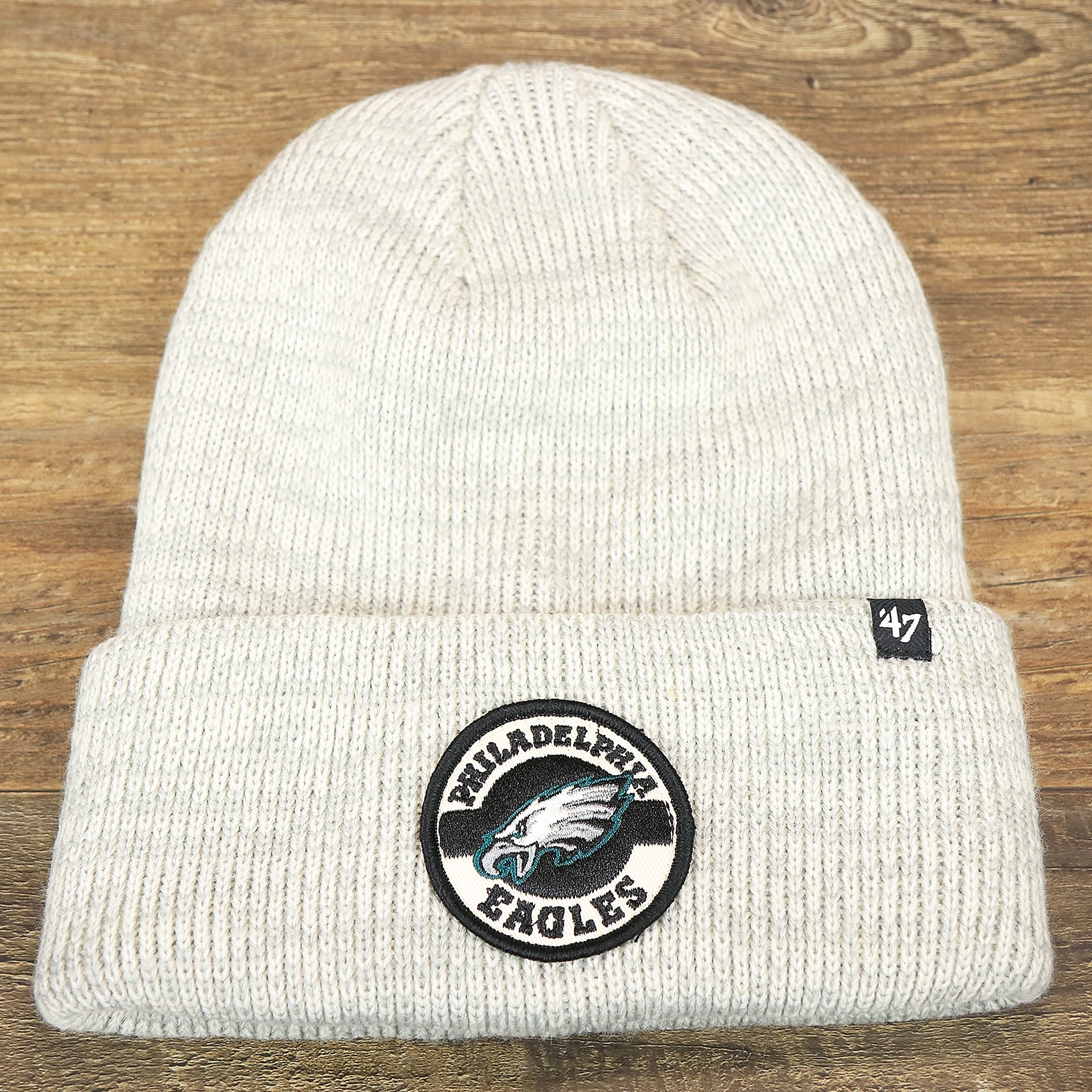The front of the Philadelphia Eagles Patch Cuffed Winter Beanie | Heather Gray Winter Beanie