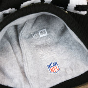 The Lining on the Philadelphia Eagles On Field Cuffed Winter Pom Pom Beanie | Black And White Winter Beanie