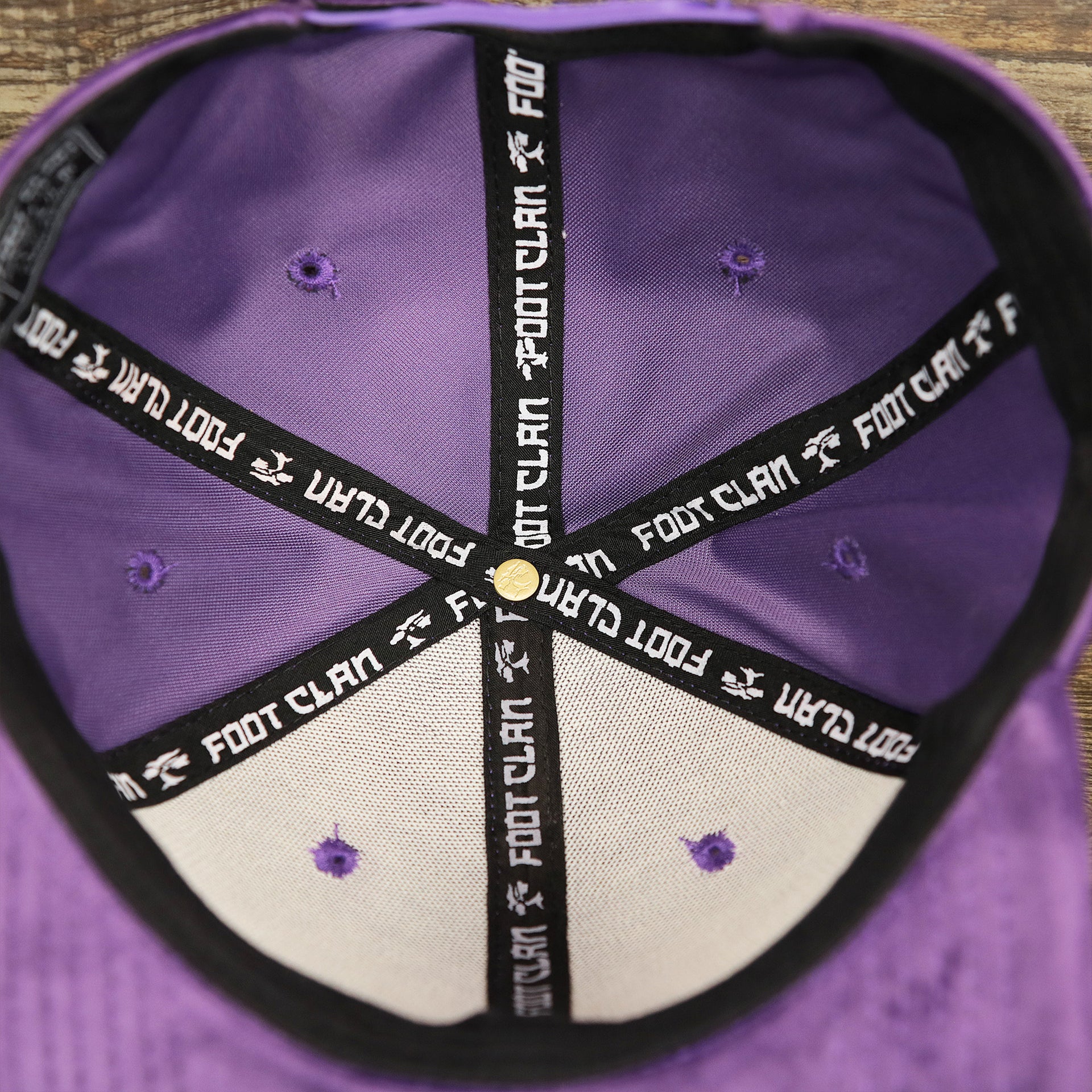 The inside of the Velour Blank Concord Grape Snapback Cap | Purple Snap Cap