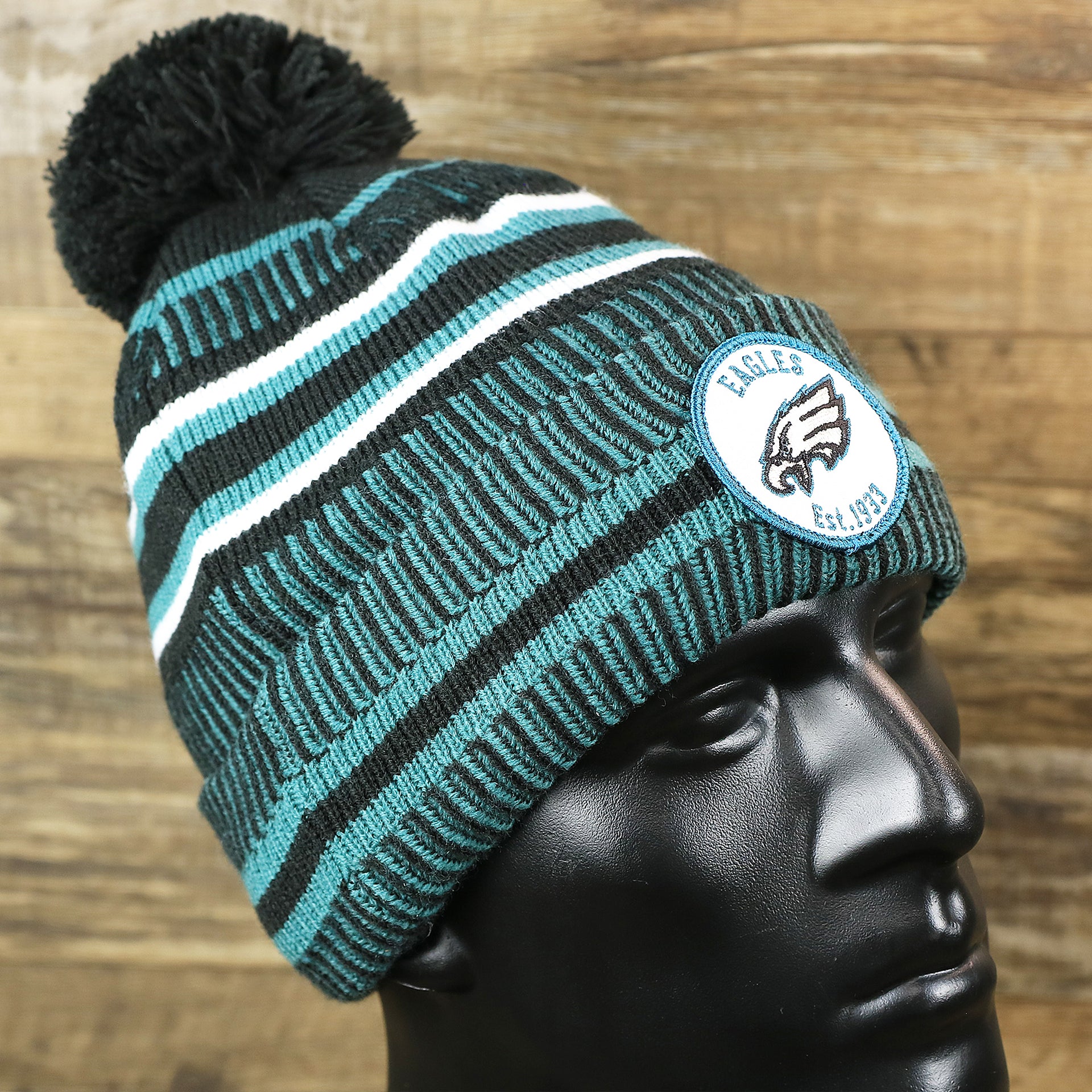 The Philadelphia Eagles Patch 1933 On Field Striped Eagles Colorway Pom Pom Winter Beanie | Black and Midnight Green Winter Beanie