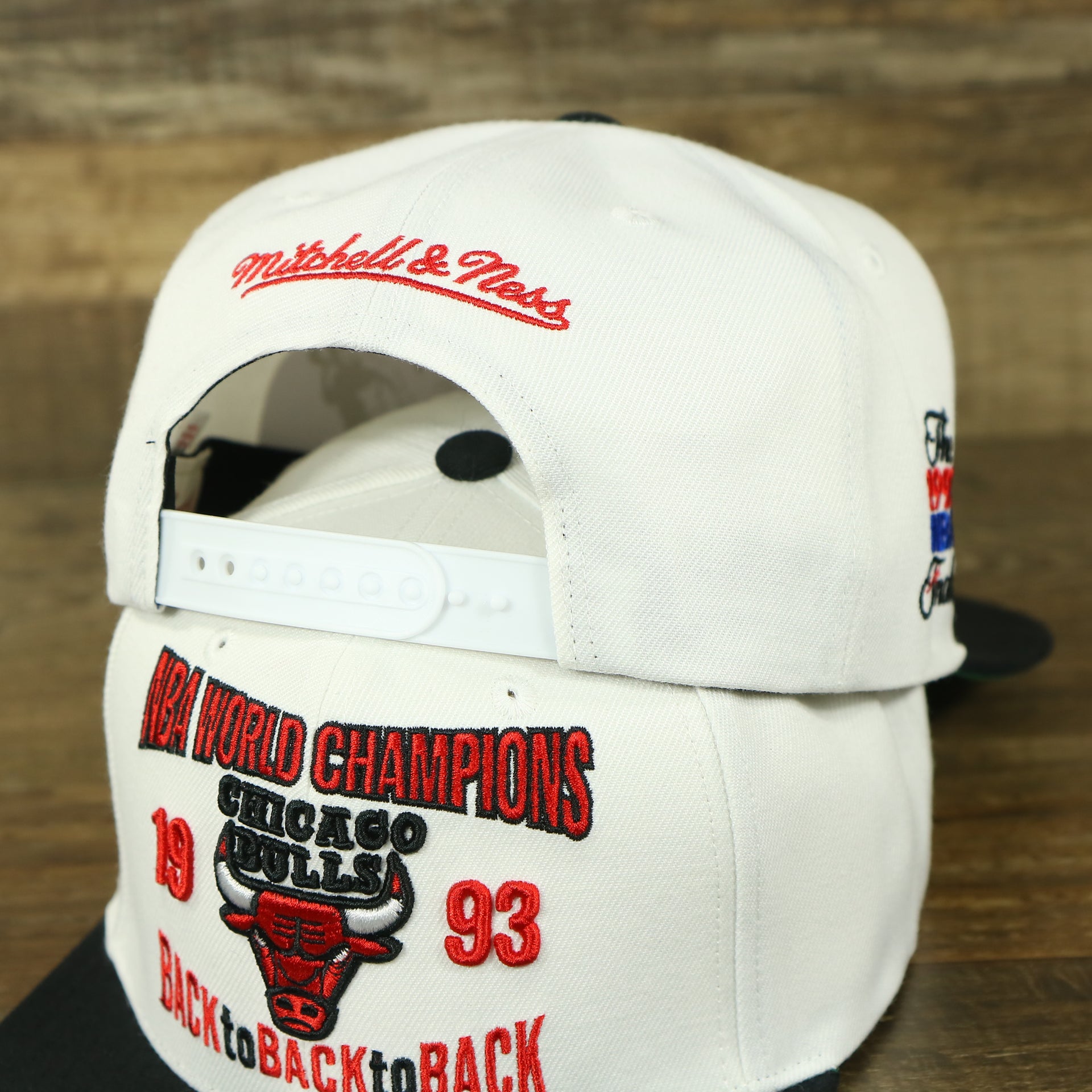 back of the Chicago Bulls Vintage Retro NBA Champions 1993 Back To Back To Back Mitchell and Ness Snapback Hat | White