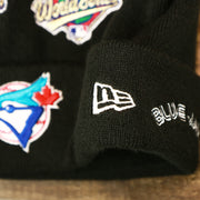 The New Era Logo on the Toronto Blue Jays All Over World Series Side Patch 2x Champion Knit Cuff Beanie | New Era, Black