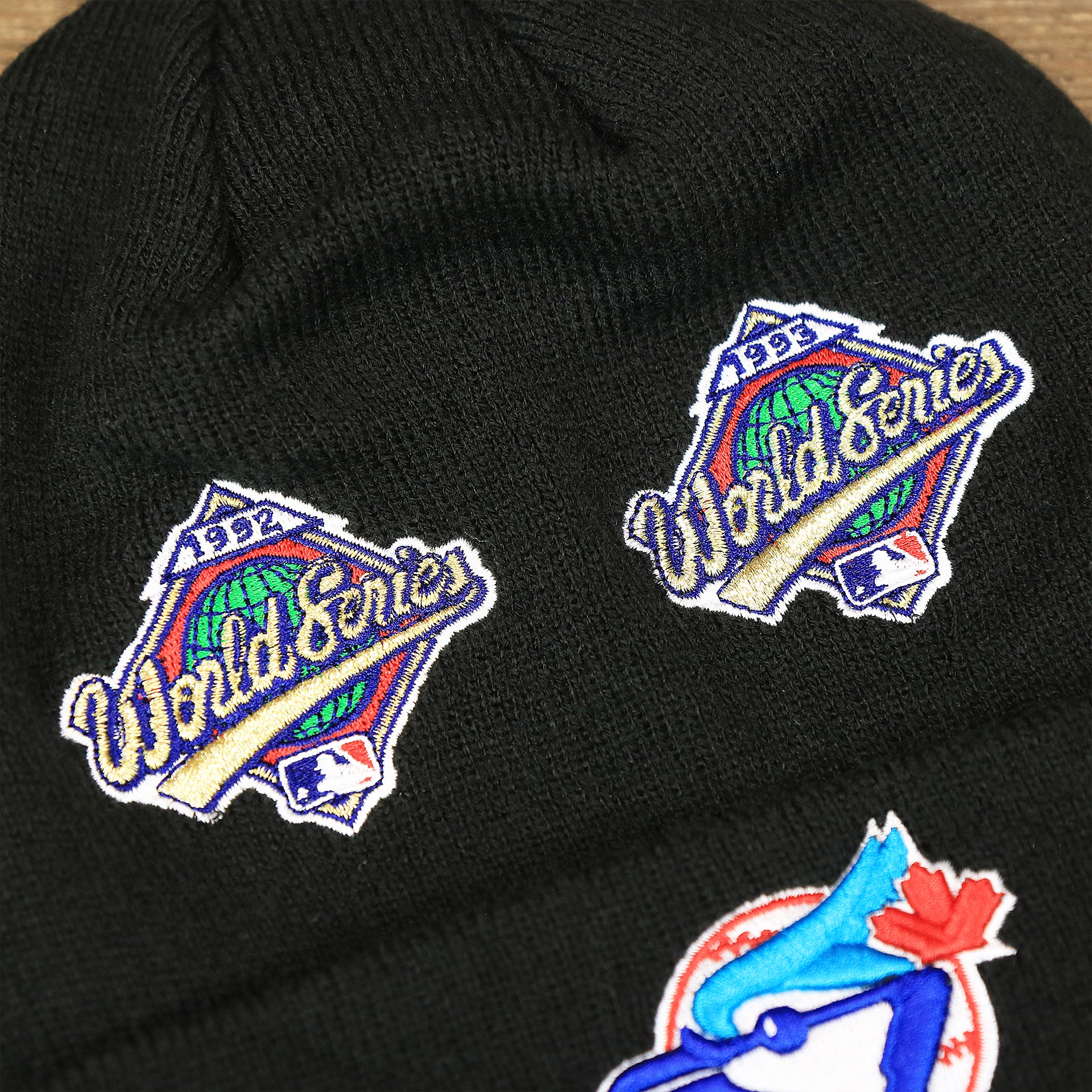 Th World Series Patches on the Toronto Blue Jays All Over World Series Side Patch 2x Champion Knit Cuff Beanie | New Era, Black