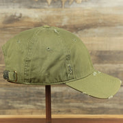 The wearer's right on the Olive Green Low Crown Distressed Adjustable Blank Baseball hat | Dark Green Dad Hat