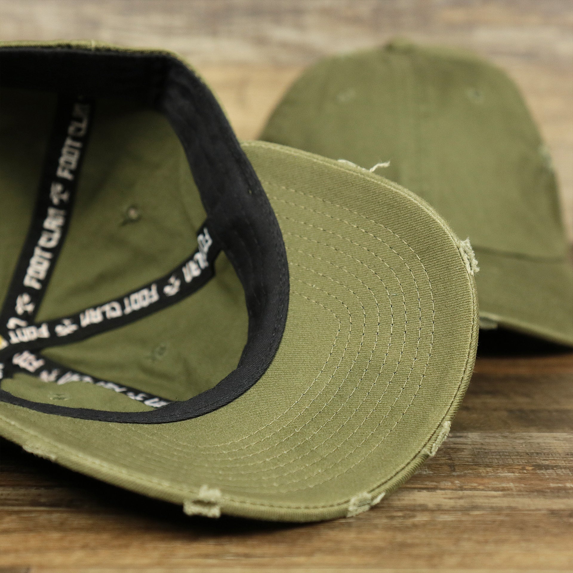 The undervisor on the Olive Green Low Crown Distressed Adjustable Blank Baseball hat | Dark Green Dad Hat