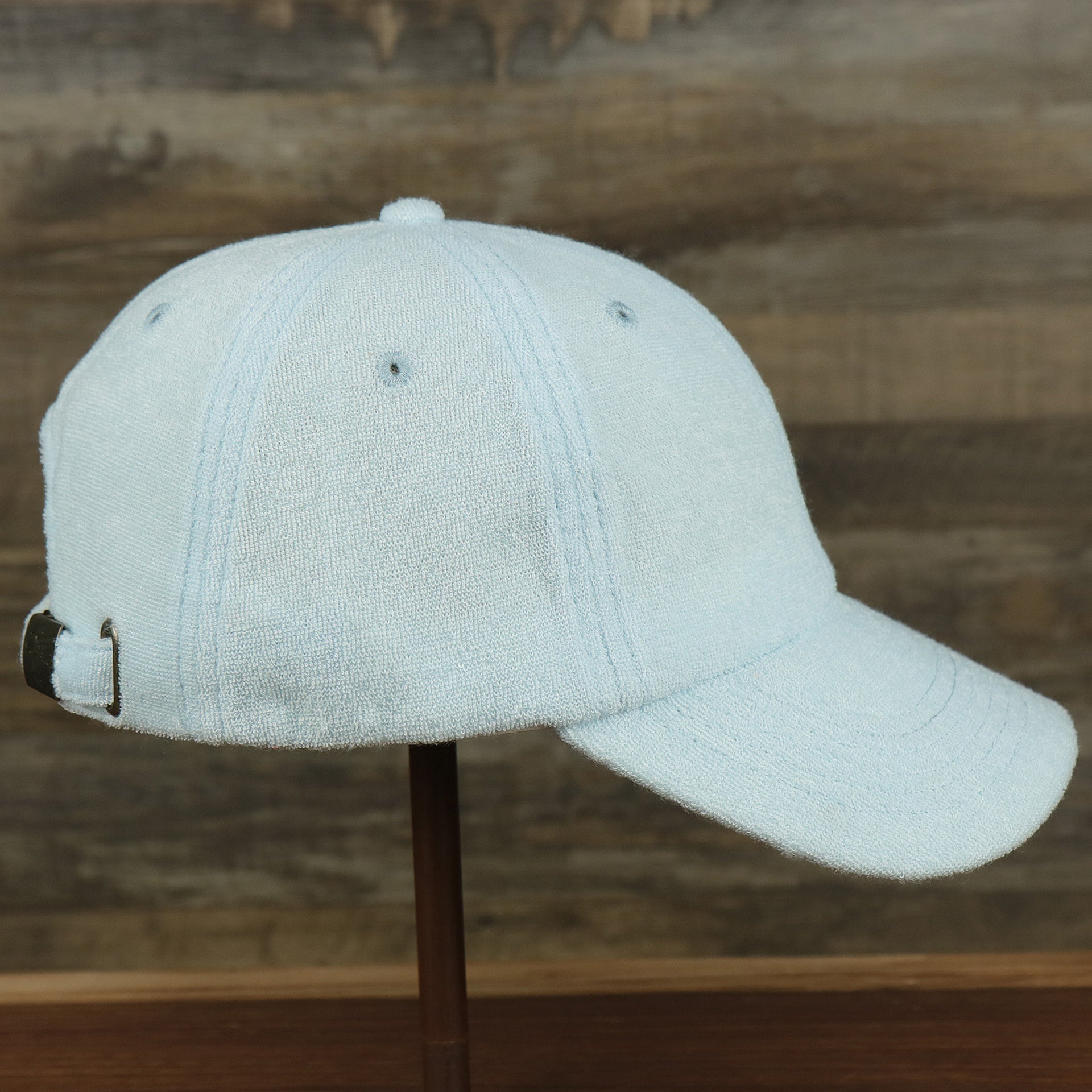 The wearer's right on the Blank Alice Blue Wash Cloth Baseball Hat | Light Blue Dad Hat