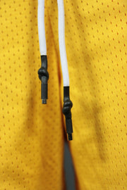 The two drawstrings of the Los Angeles yellow mens shorts with zipper pockets.
