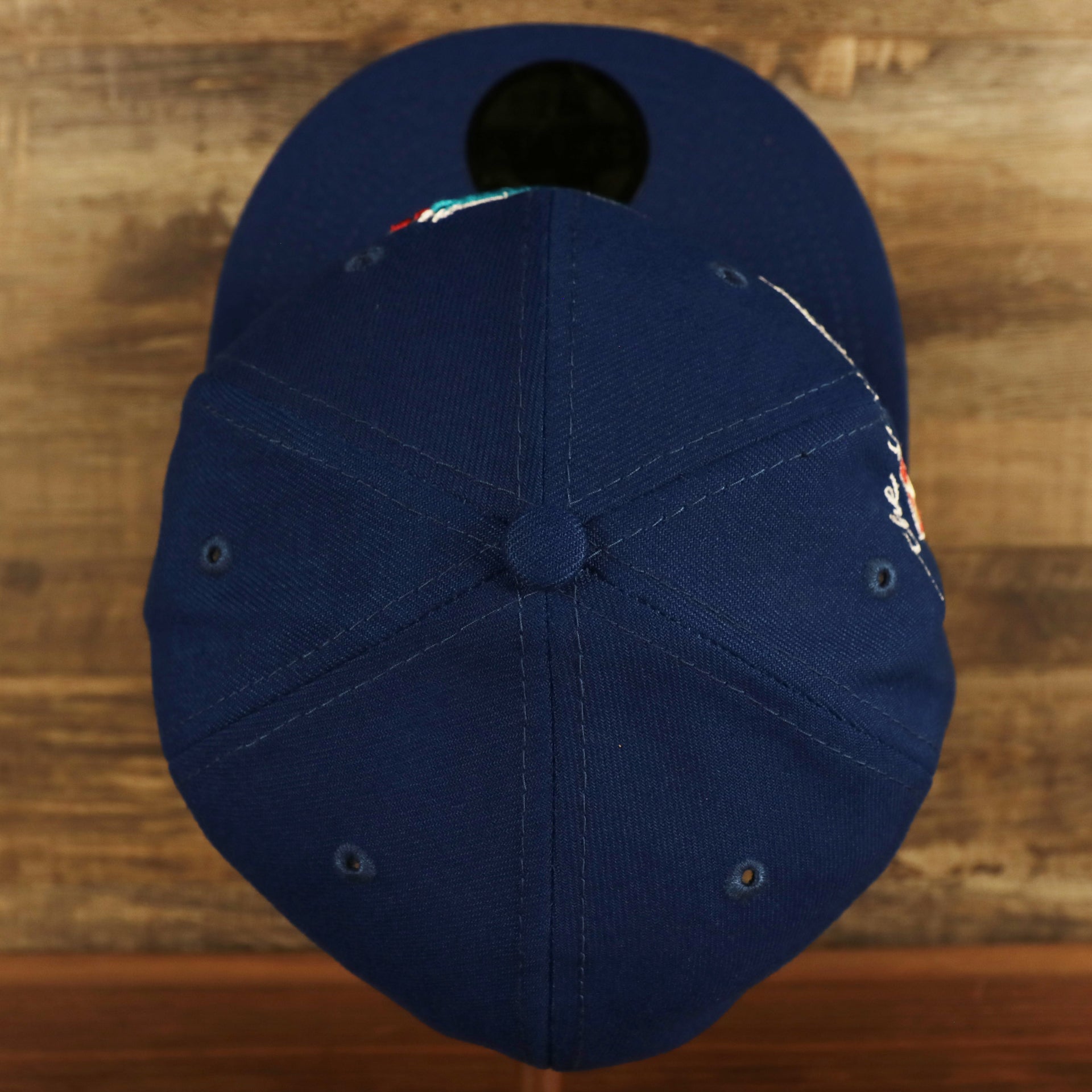 Top down view of the Toronto Blue Jays "City Cluster" Side Patch Gray Bottom Royal 59Fifty Fitted Cap