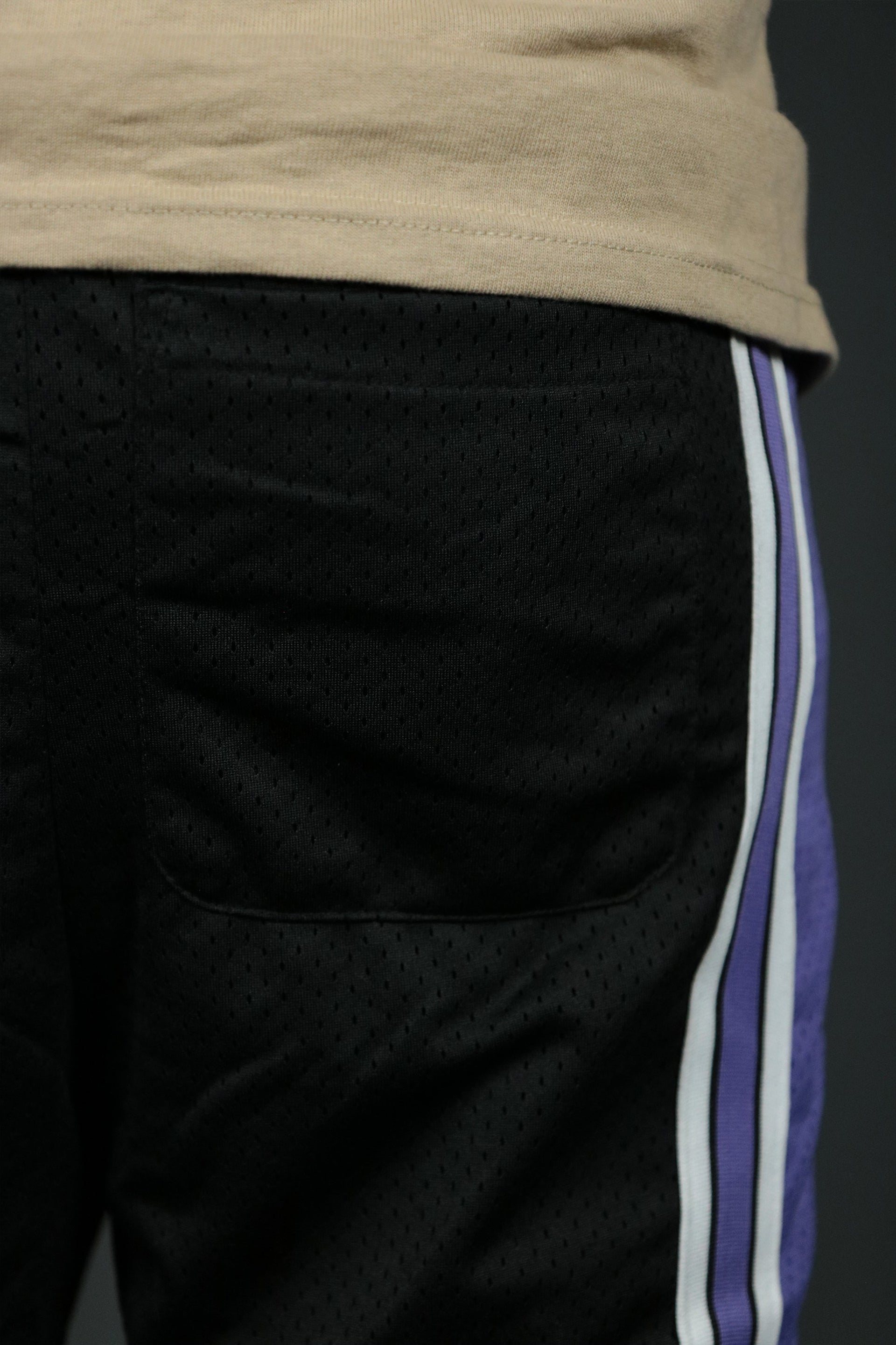 The back pocket of the black purple men's mesh basketball shorts for Sacramento.